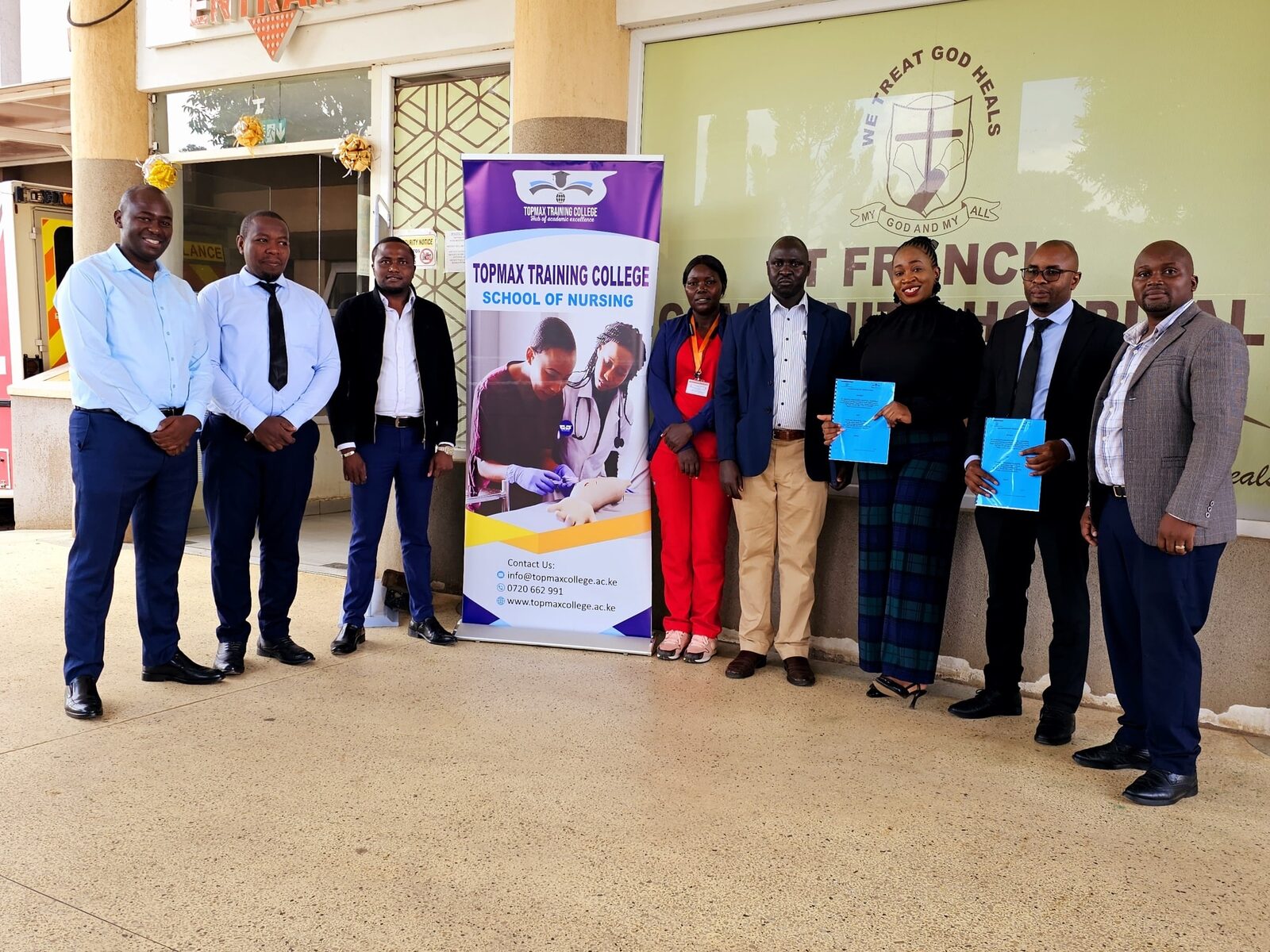 Topmax representatives formalizing a healthcare training partnership